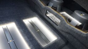 The inside of a trunk with a car audio build