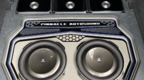 A pinnacle autosound speaker set installed in the trunk of a vehicle
