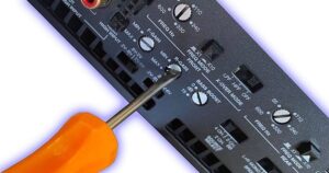 A screwdriver and an amplifier