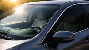 A car without window tint in the sun